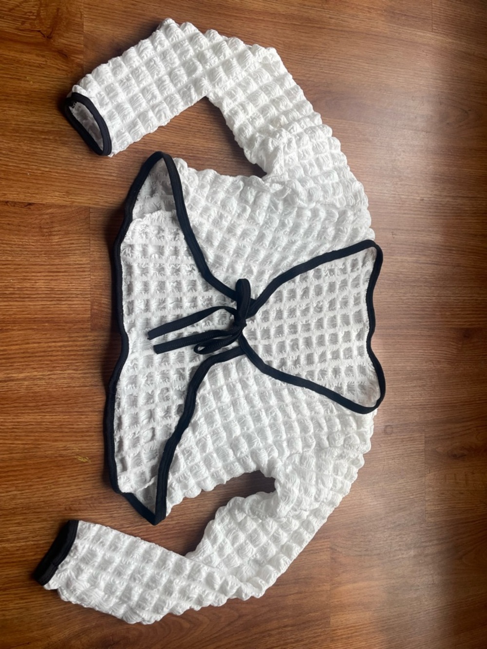 White Waffle Knit Wrap Top with Black Trim